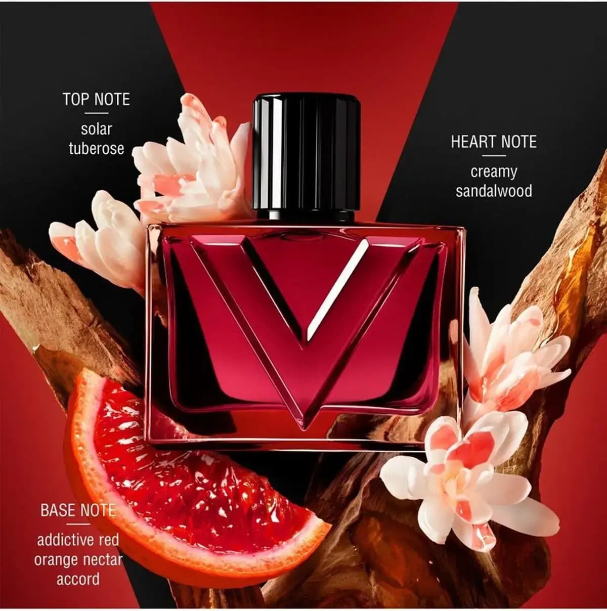 Donna bottle among tuberose blossoms, sandalwood and blood orange slice, labelled with top, heart and base notes