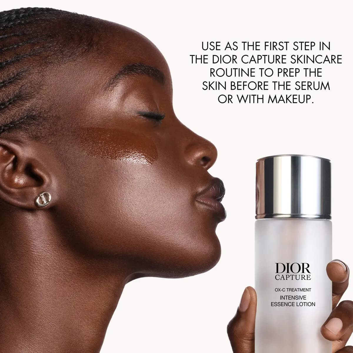 Model in profile with a glossy cheek swipe holds the lotion, with text calling it the first step to prep skin.