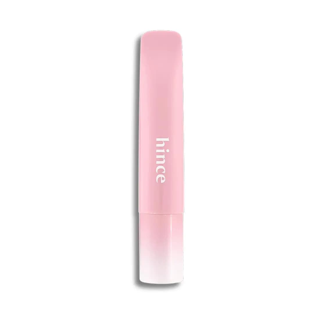 Light pink hince lip balm tube with white logo and pink-to-white gradient cap