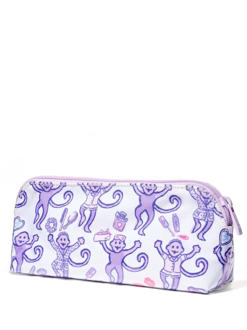 White makeup bag with lavender monkey print, makeup doodles and lilac zipper