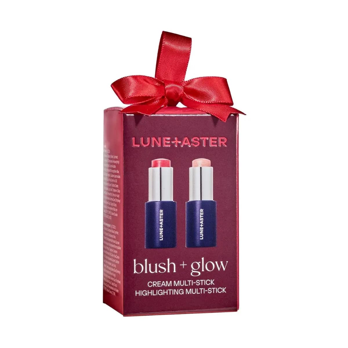 Lune+Aster blush + glow burgundy box with red bow, showing cream blush and highlighting multi-sticks