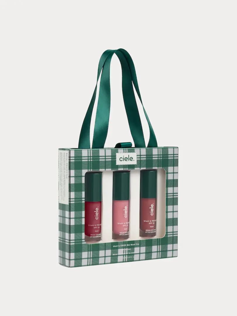 Blush & Cheer Mini Blush Trio in a green plaid box with satin ribbon handles and a window showing three blushes