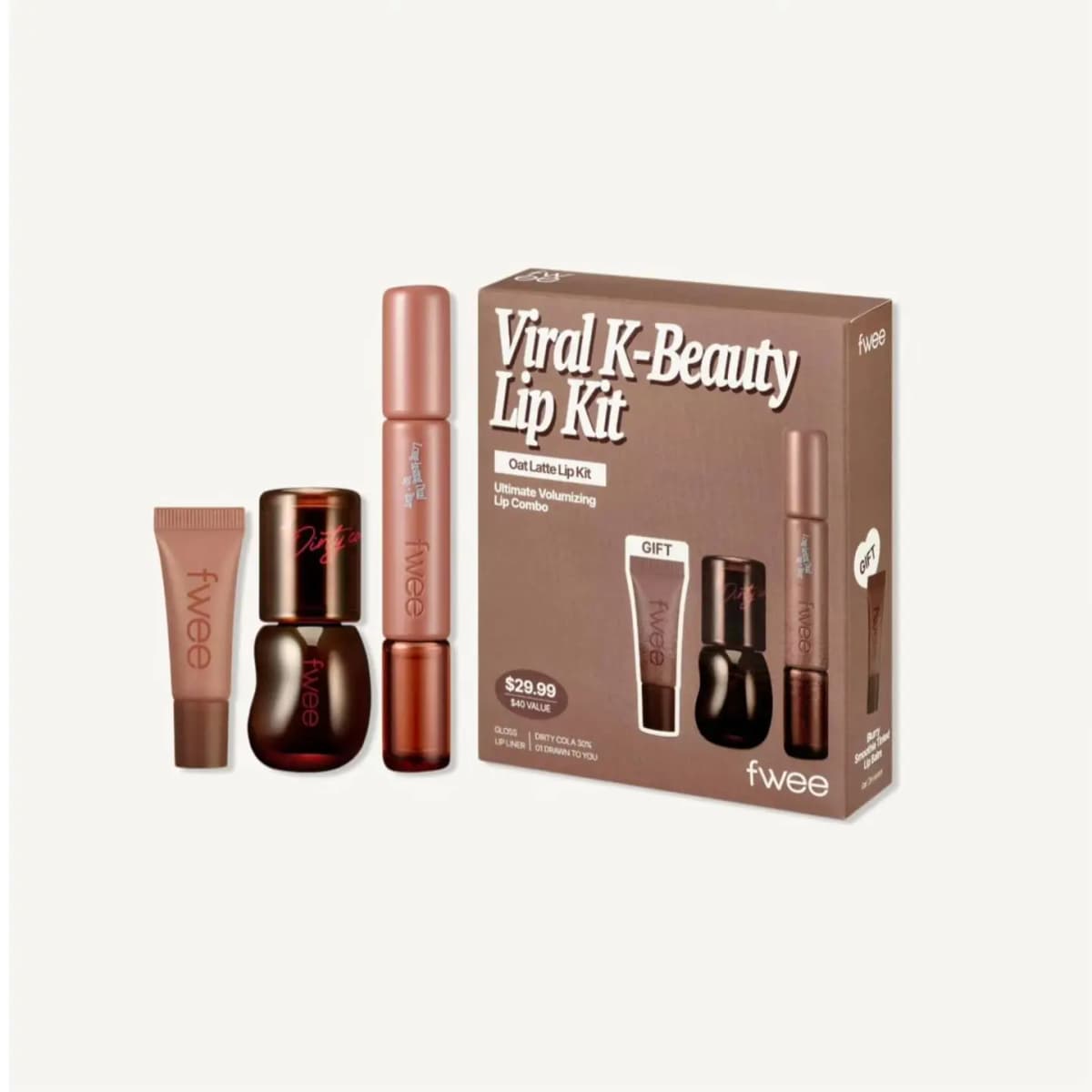 Fwee Viral K-Beauty Lip Kit box beside a mini balm tube, Dirty Cola gloss bottle and dual lip-and-liner stick.