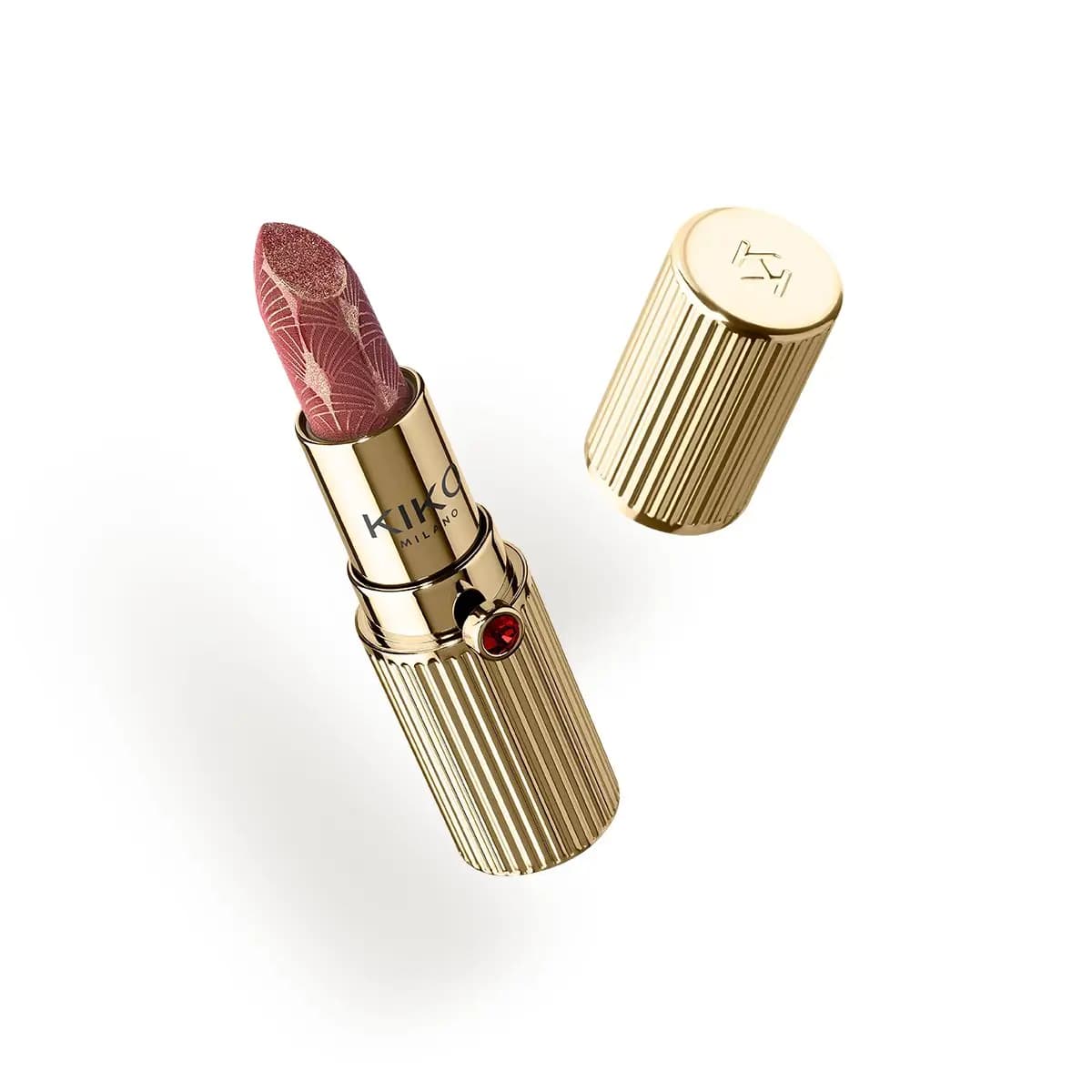 Fluted gold lipstick with red jewel and mauve bullet engraved with a gold art deco pattern