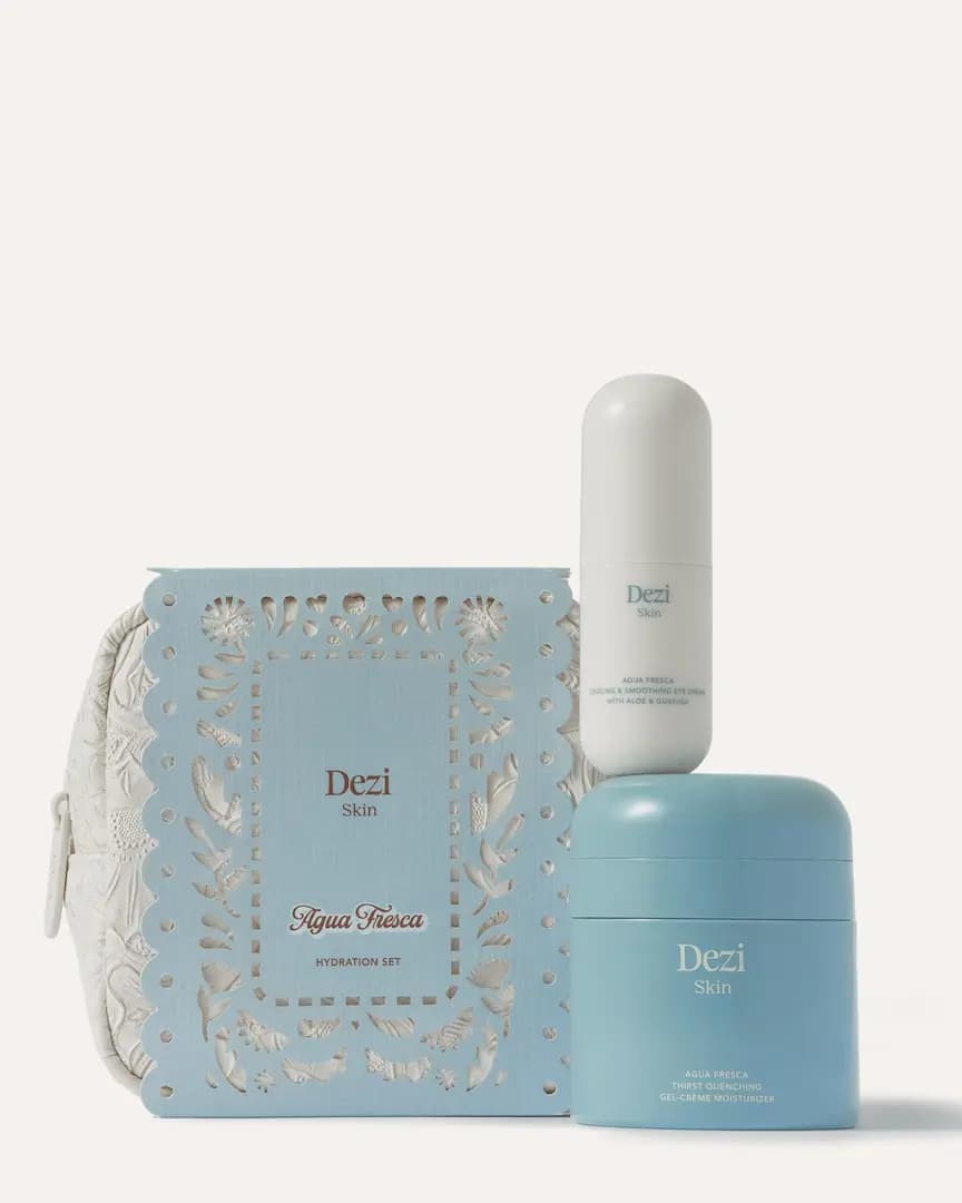 Dezi Skin Agua Fresca Hydration Gift Set: blue papel picado box, cream embossed bag, white eye cream tube and blue jar