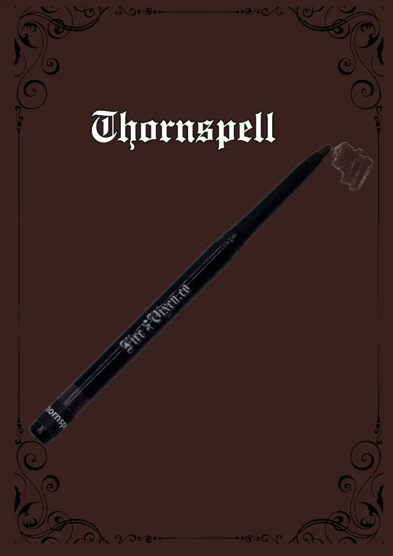 Thornspell retractable lip liner with a deep dark brown swatch on a dark brown background framed by black flourishes