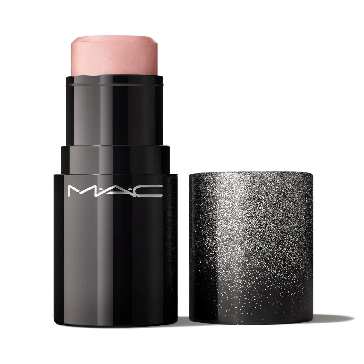M·A·C stick with a shimmery pale pink bullet in a glossy black case beside a silver glitter-to-black cap.