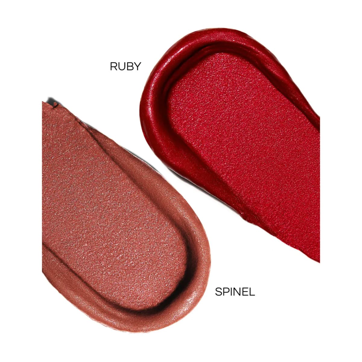 Smeared swatches of Ruby, a pearly deep red, and Spinel, a shimmery rosy brown, on white