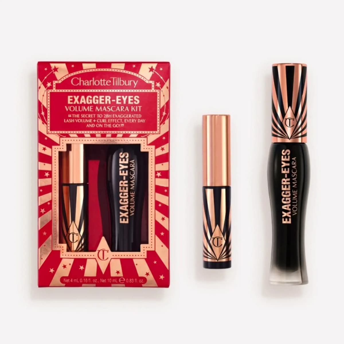 Exagger-Eyes Volume Mascara Kit in a red sunburst box with a mini and full-size black and rose-gold mascara