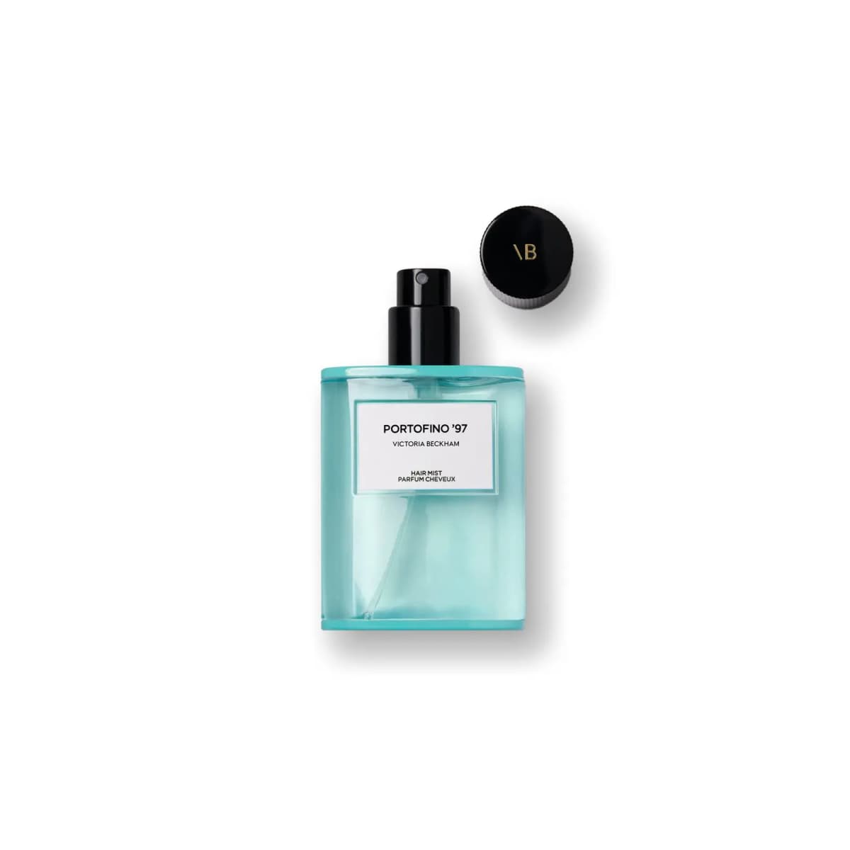 Turquoise glass Portofino '97 Victoria Beckham hair mist bottle with black pump beside a round black VB cap