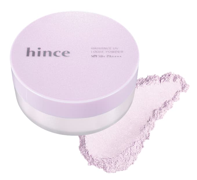 Lilac jar of hince Radiance UV Loose Powder SPF50+ PA++++ beside a shimmery pale lavender powder swatch
