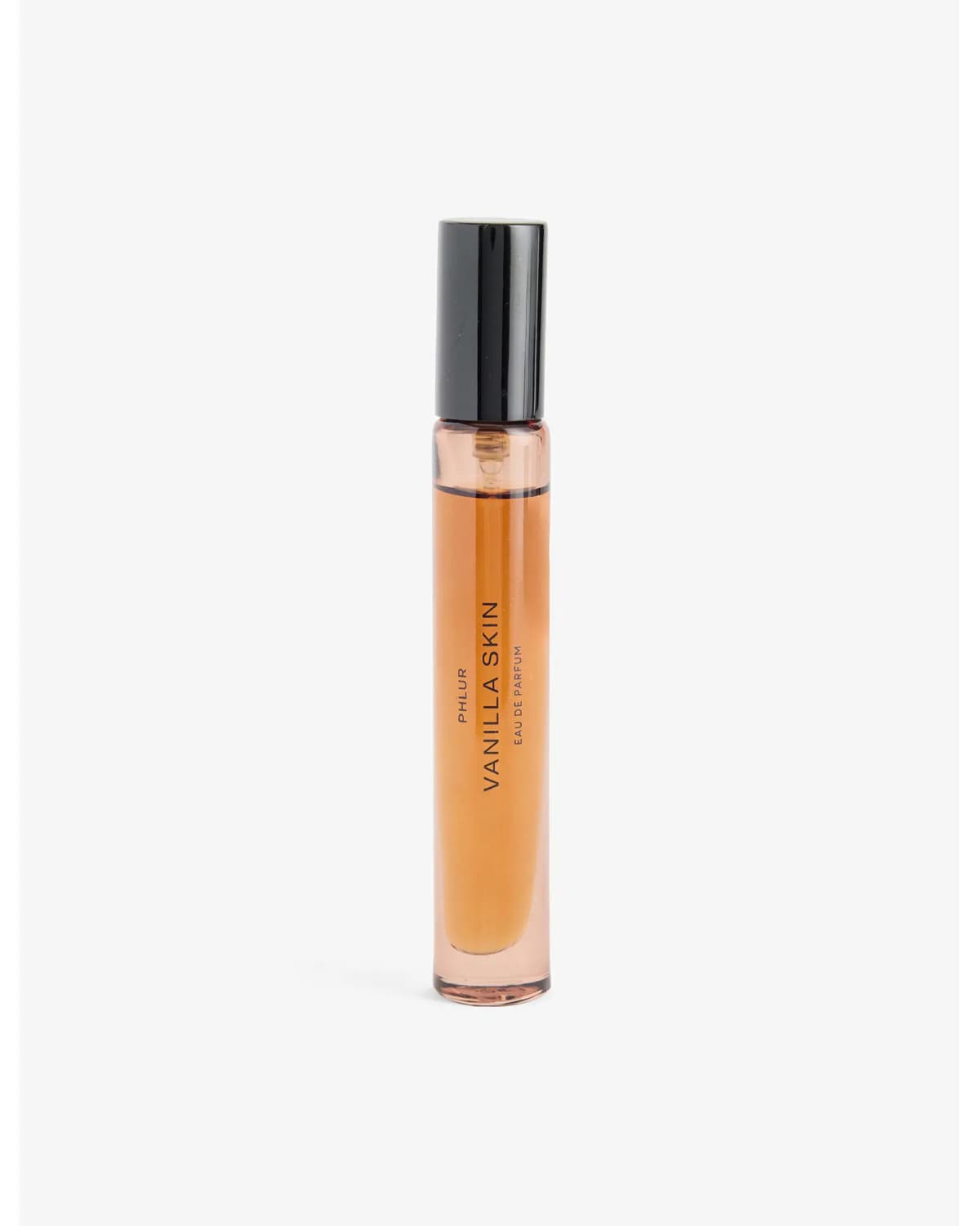 Phlur Vanilla Skin eau de parfum travel spray with amber liquid and black cap