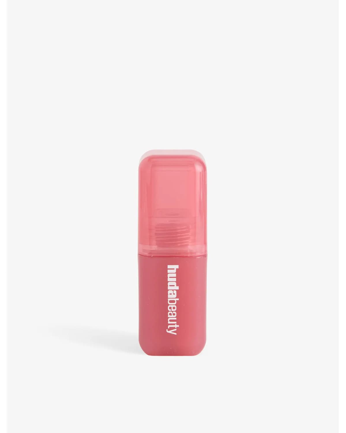 Huda Beauty square pink bottle with translucent pink cap and white logo
