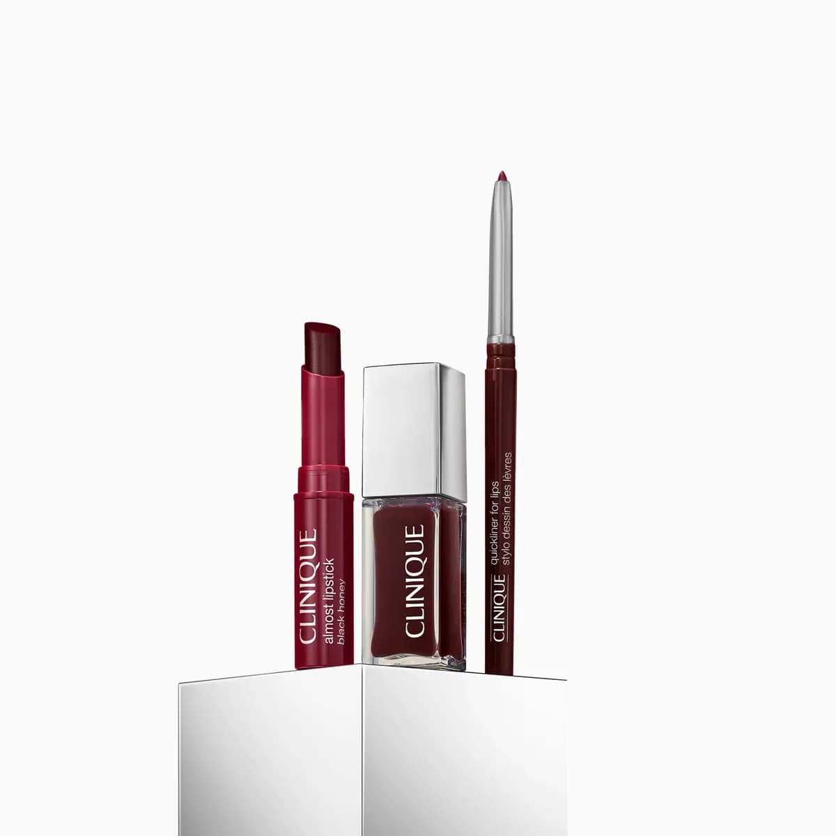 Almost Lipstick in Black Honey with a deep berry lip gloss and Quickliner for Lips in burgundy
