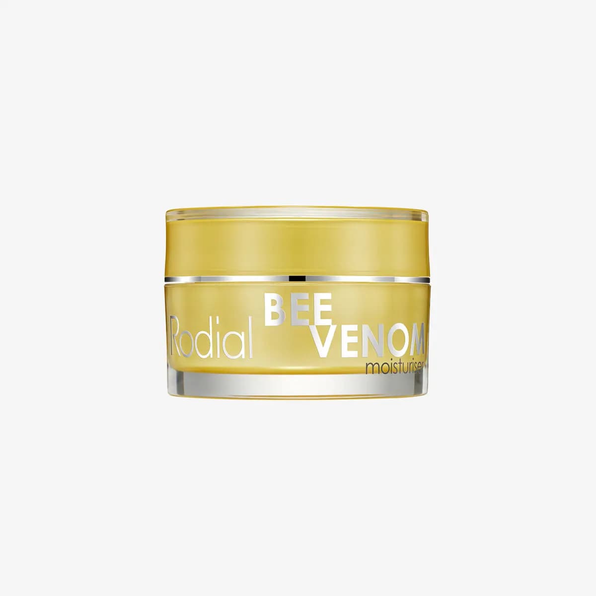 Gold Rodial Bee Venom Moisturiser jar with silver lettering and silver band on a pale grey background