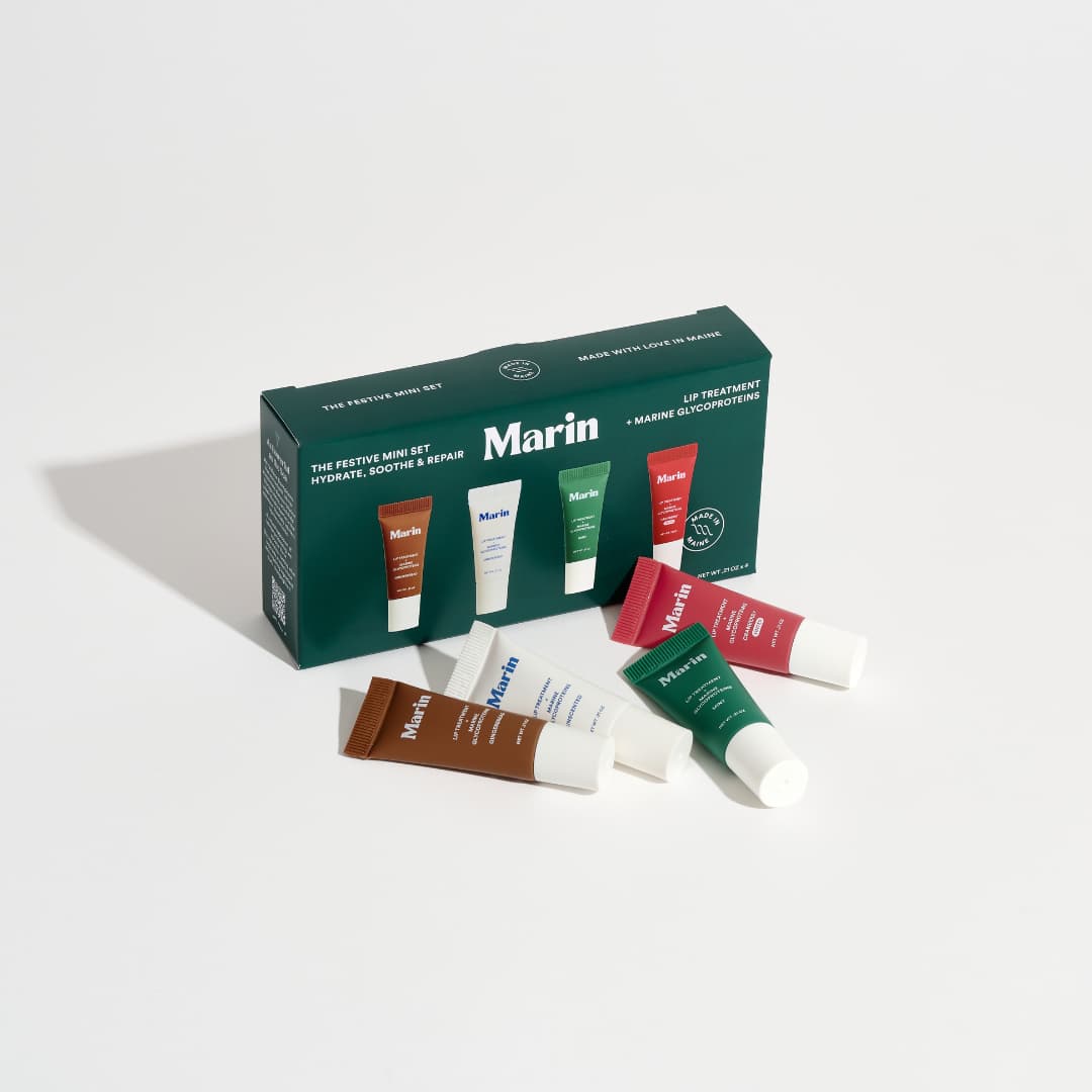 Green Festive Mini Set box at an angle with Gingerbread, Unscented, Mint and Cranberry minis in front