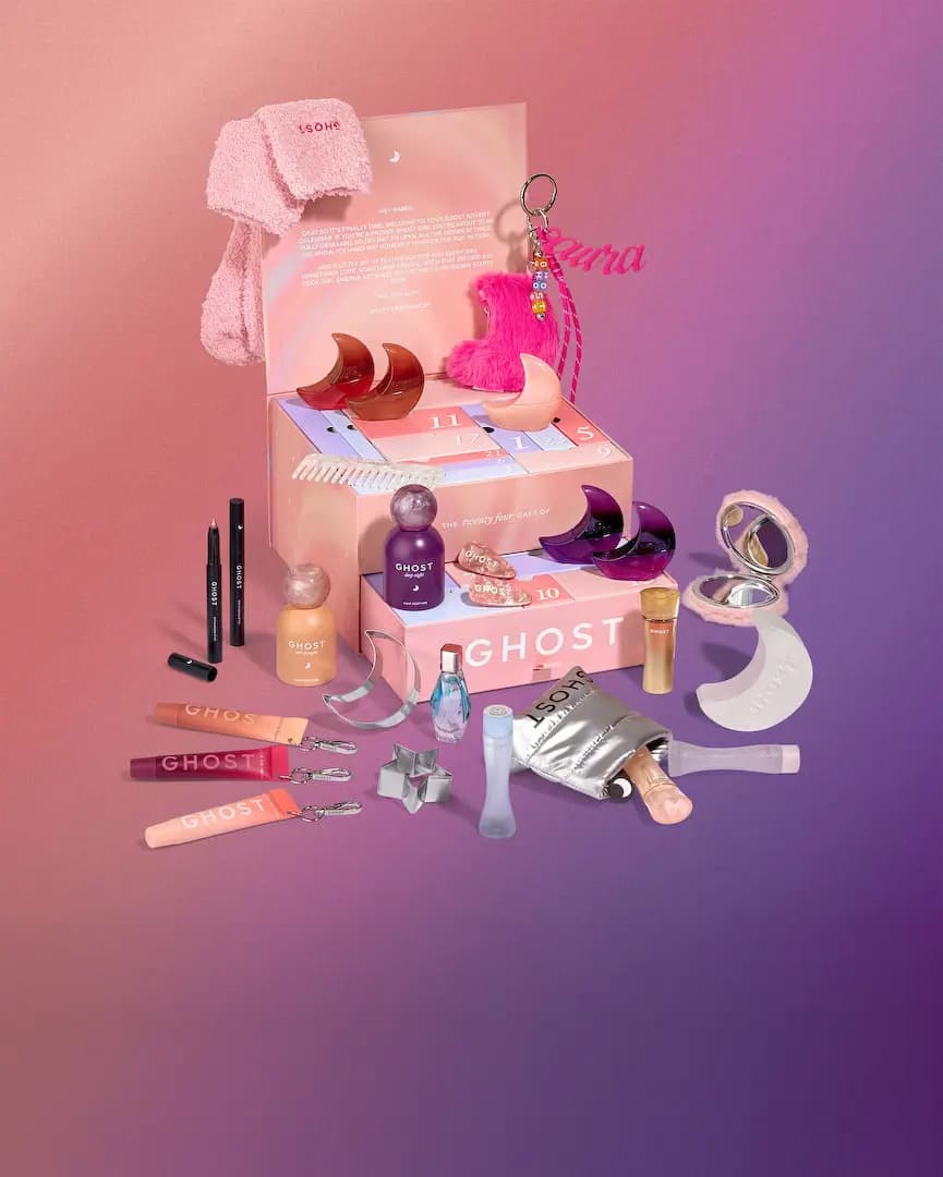Ghost Fragrances Advent Calendar 2026 open pink box with moon perfumes, hair perfumes, lip serums, socks and accessories