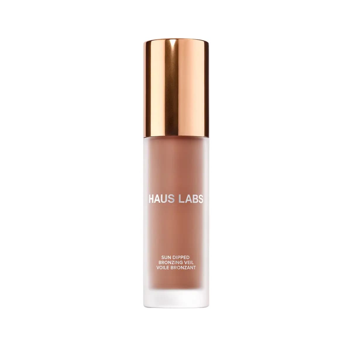 Haus Labs Sun Dipped Bronzing Veil in a frosted glass bottle with warm brown liquid and a glossy rose-gold cap
