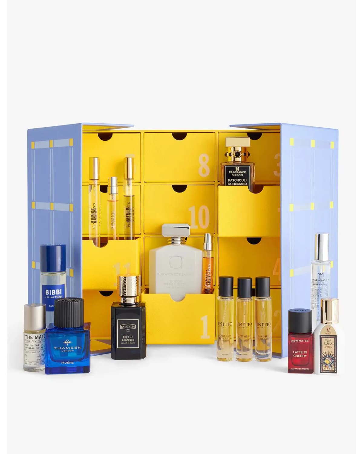 Open blue box with yellow numbered drawers, Ormonde Jayne Suede Silhouette inside and minis lined up in front