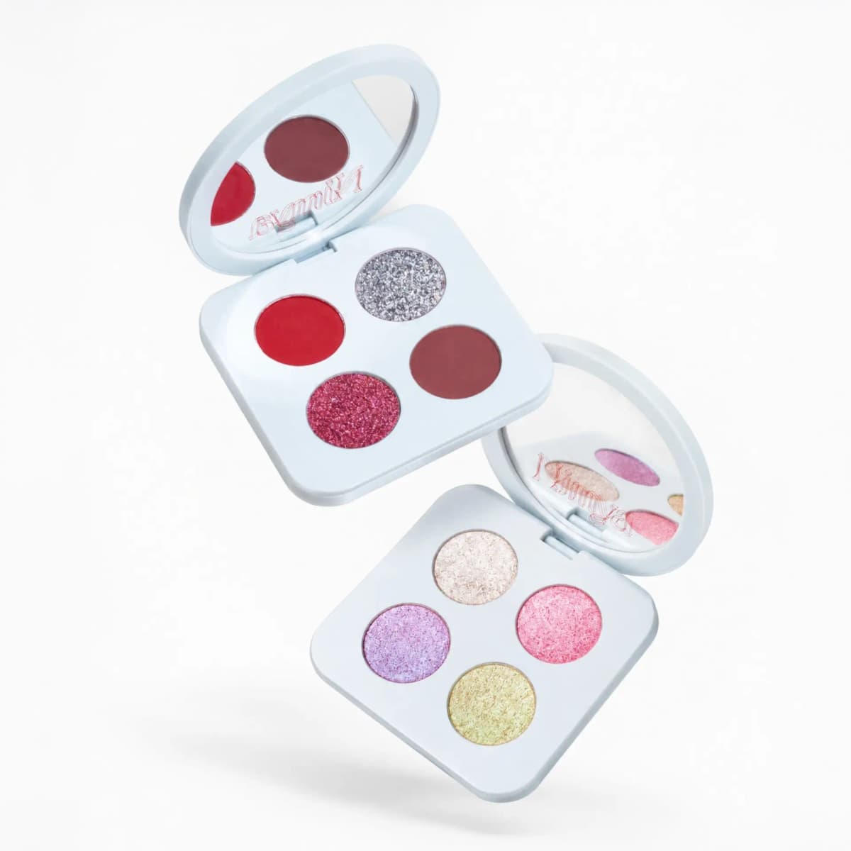 Red-toned quad floating above a second Nimya quad of champagne, pink, lilac and gold shimmers