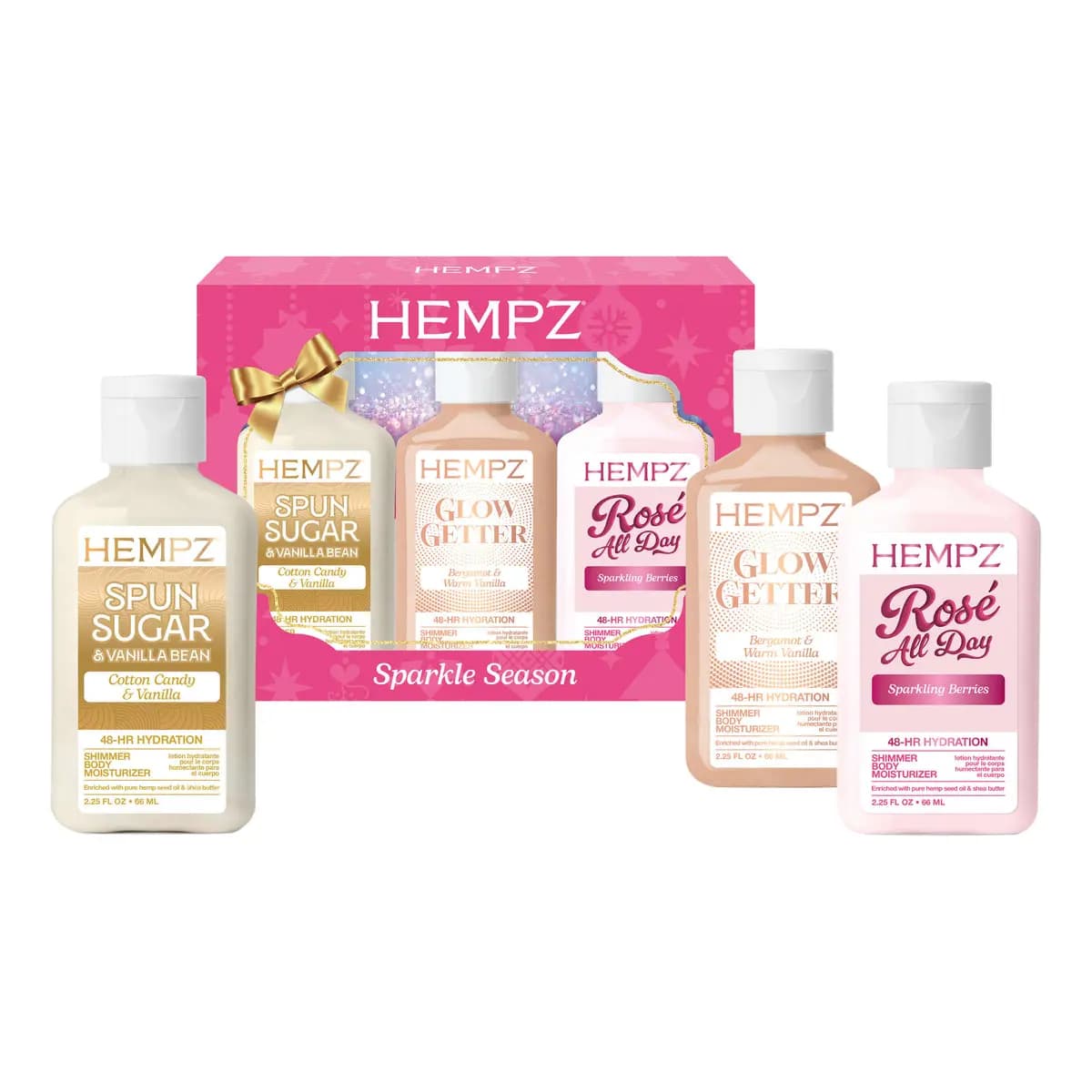Sparkle Season set contents: Spun Sugar, Glow Getter, and Rosé All Day shimmer body moisturizers beside pink box