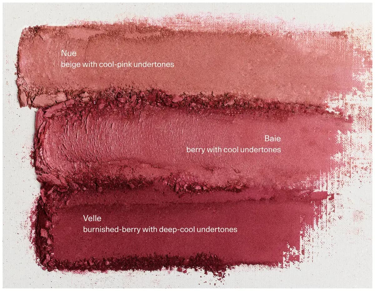 Powder swatches of Nue, Baie and Velle, from beige-pink to deep burnished berry, labelled with undertones