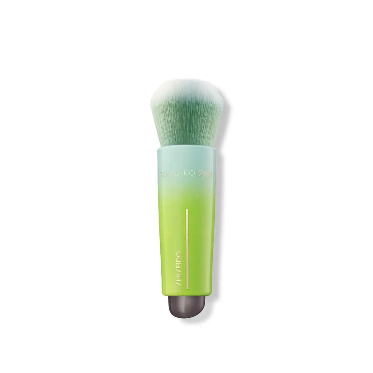Lime-to-mint gradient SHISEIDO face brush with green and white bristles, Tomo Koizumi logo in gold