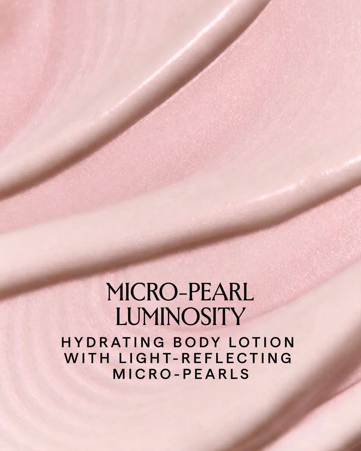 Close-up of swirled pink lotion with micro-pearl shimmer and text: Micro-Pearl Luminosity