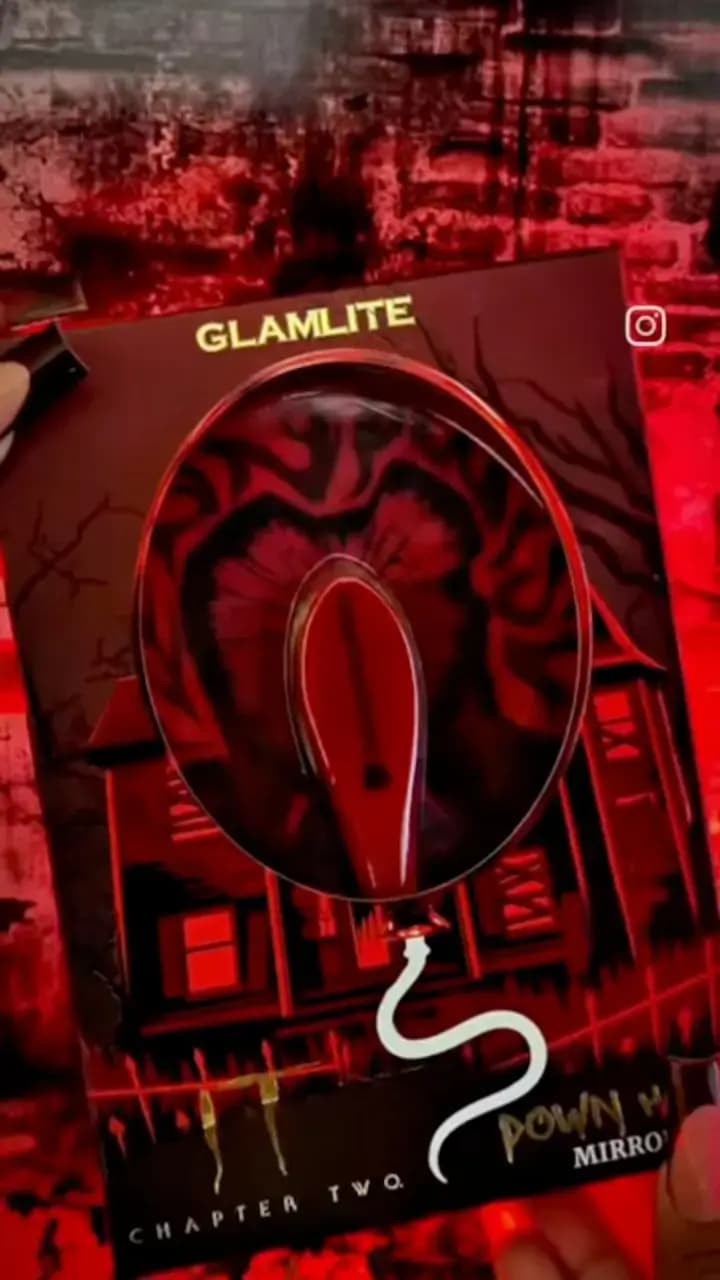 Mirror in its retail card packaging with haunted house art, a balloon string and IT Chapter Two branding