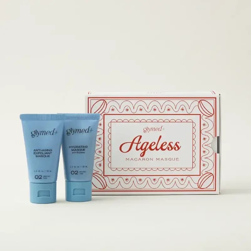 GlyMed+ Ageless Macaron Masque set: two blue masque tubes beside a white box with a red scalloped macaron border
