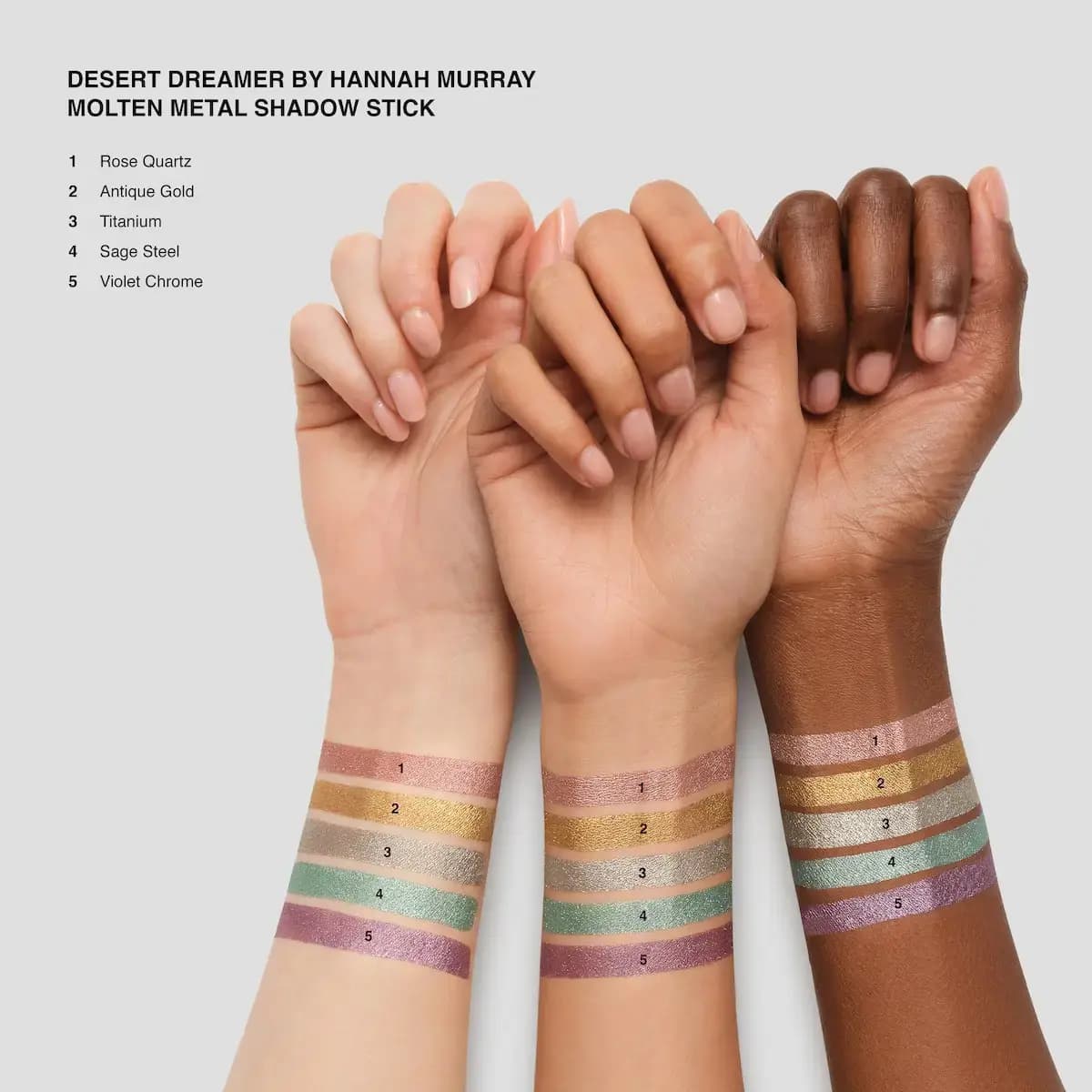 Five metallic Molten Metal Shadow Stick shades swatched on the inner wrists of light, medium and deep skin tones.