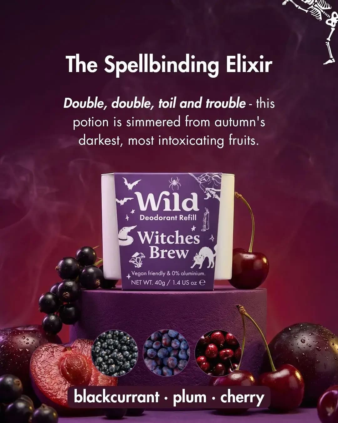 Purple Wild Witches Brew deodorant refill on a plinth with plums, cherries and blackcurrants, titled The Spellbinding Elixir