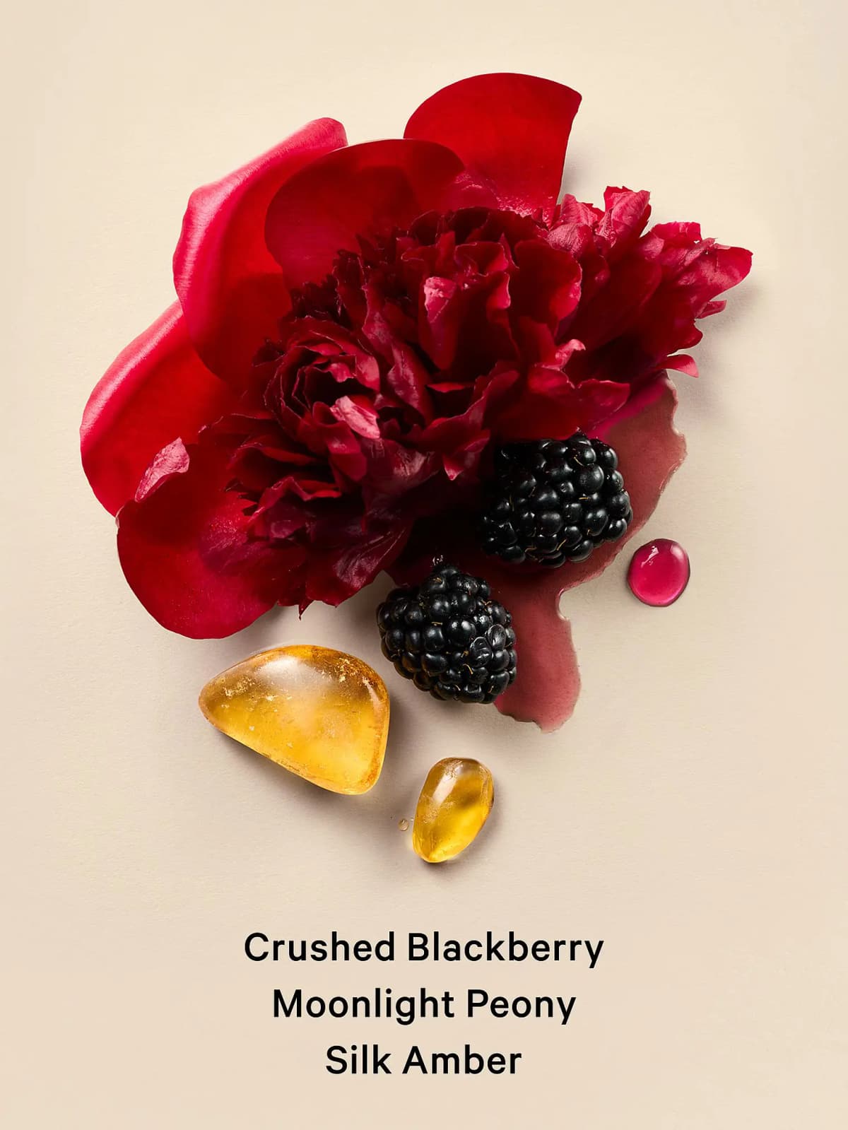 Red peony, two blackberries, amber stones and a pink liquid drop, captioned Crushed Blackberry, Moonlight Peony, Silk Amber
