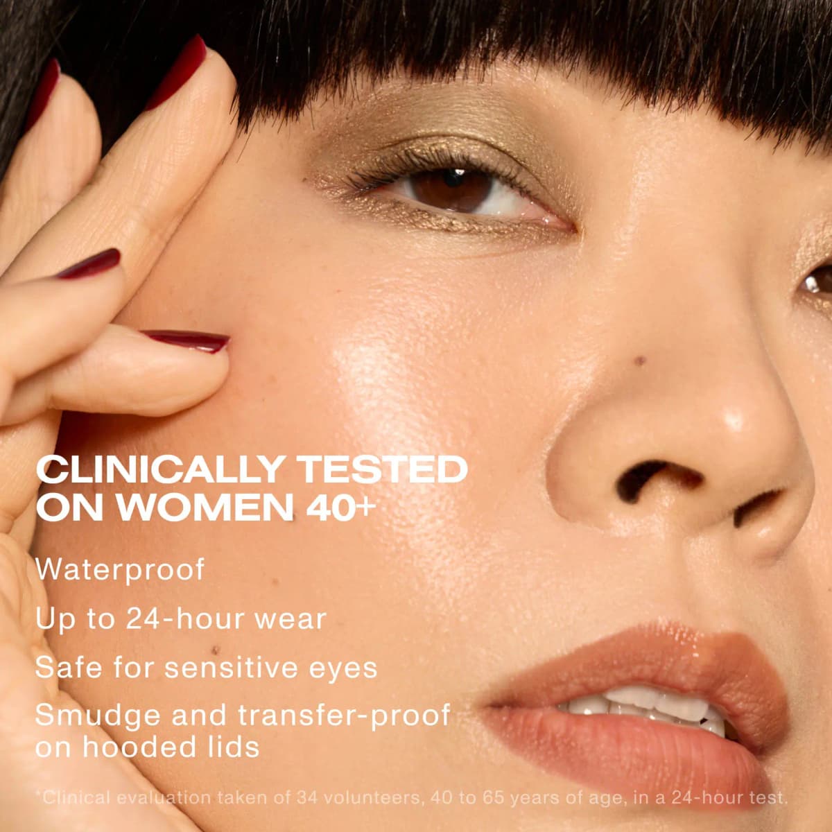 Close-up of a woman with gold-lined eyes and text on waterproof, 24-hour wear clinically tested on women 40+.
