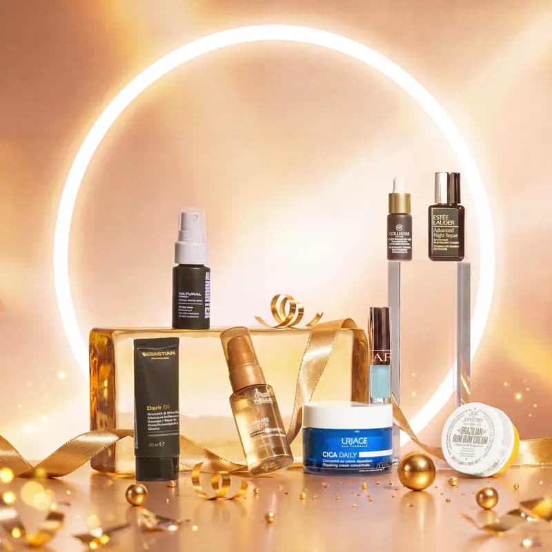 Luxury skincare arranged in a ring of light: Estée Lauder, Uriage Cica Daily, Wella, Collistar and Sol de Janeiro