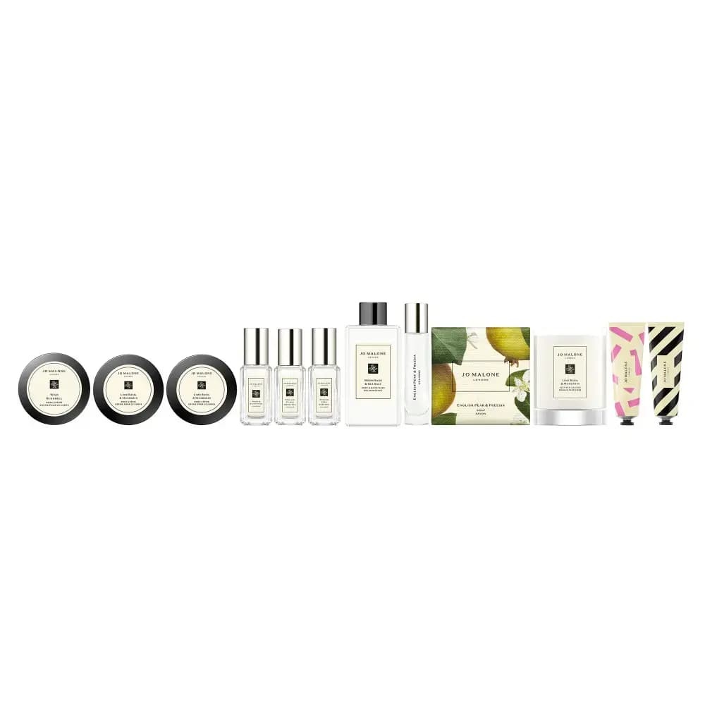 Twelve Jo Malone London minis in a row: body crème jars, colognes, body wash, soap, candle and two patterned hand creams