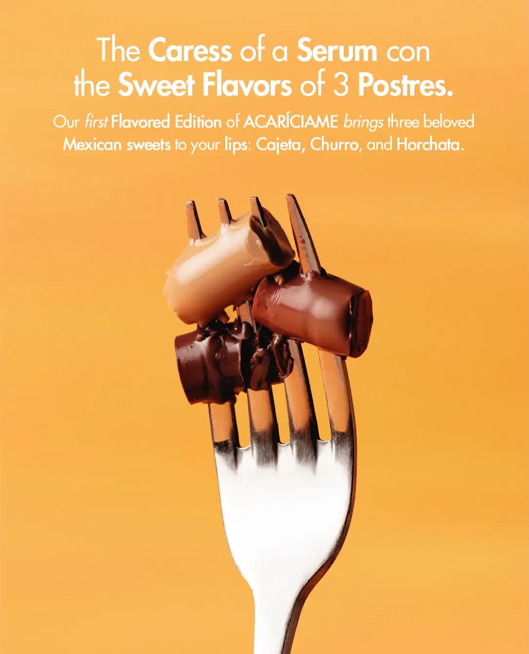 Three bullets of caramel, brown and dark brown lip serum speared on a silver fork against an orange backdrop