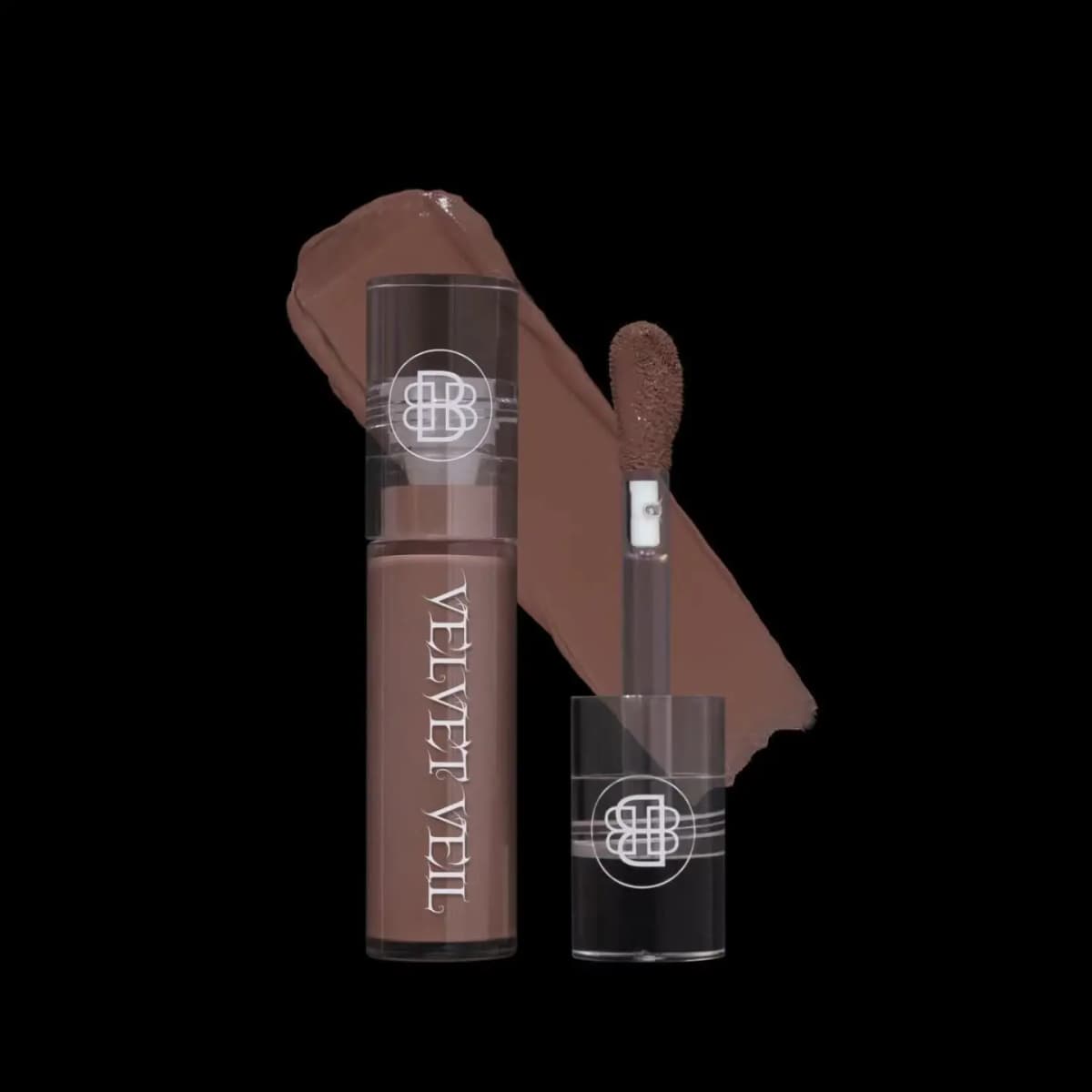 Medium cool taupe-brown lip mud tube beside its doe-foot wand and a smooth swatch