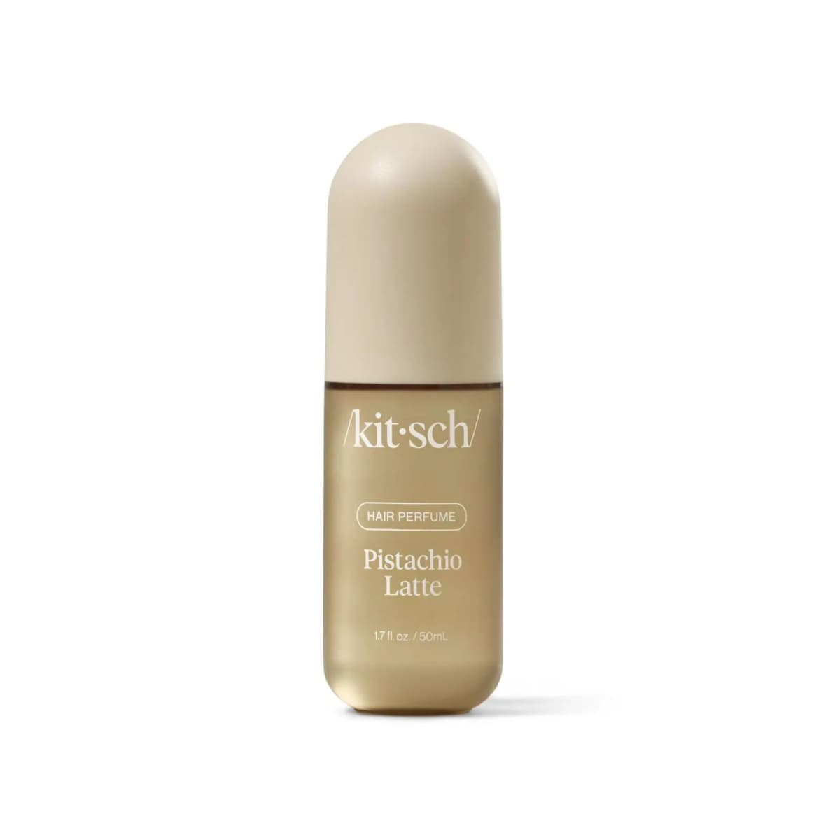 Kitsch Pistachio Latte Hair Perfume in a frosted gold 50 mL bottle with a rounded beige cap
