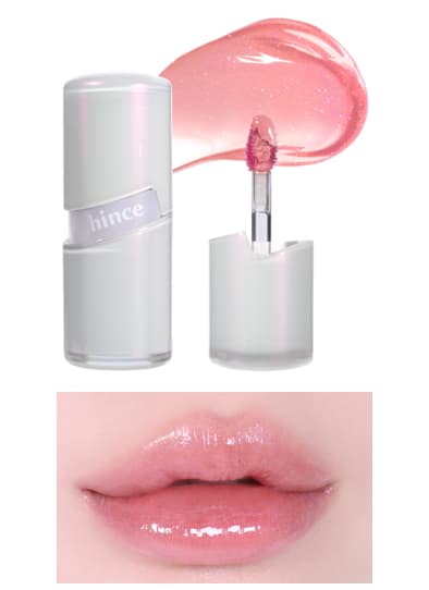 Pearly white lip gloss tube with doe-foot applicator, sheer pink glitter swatch and glossy pink lips