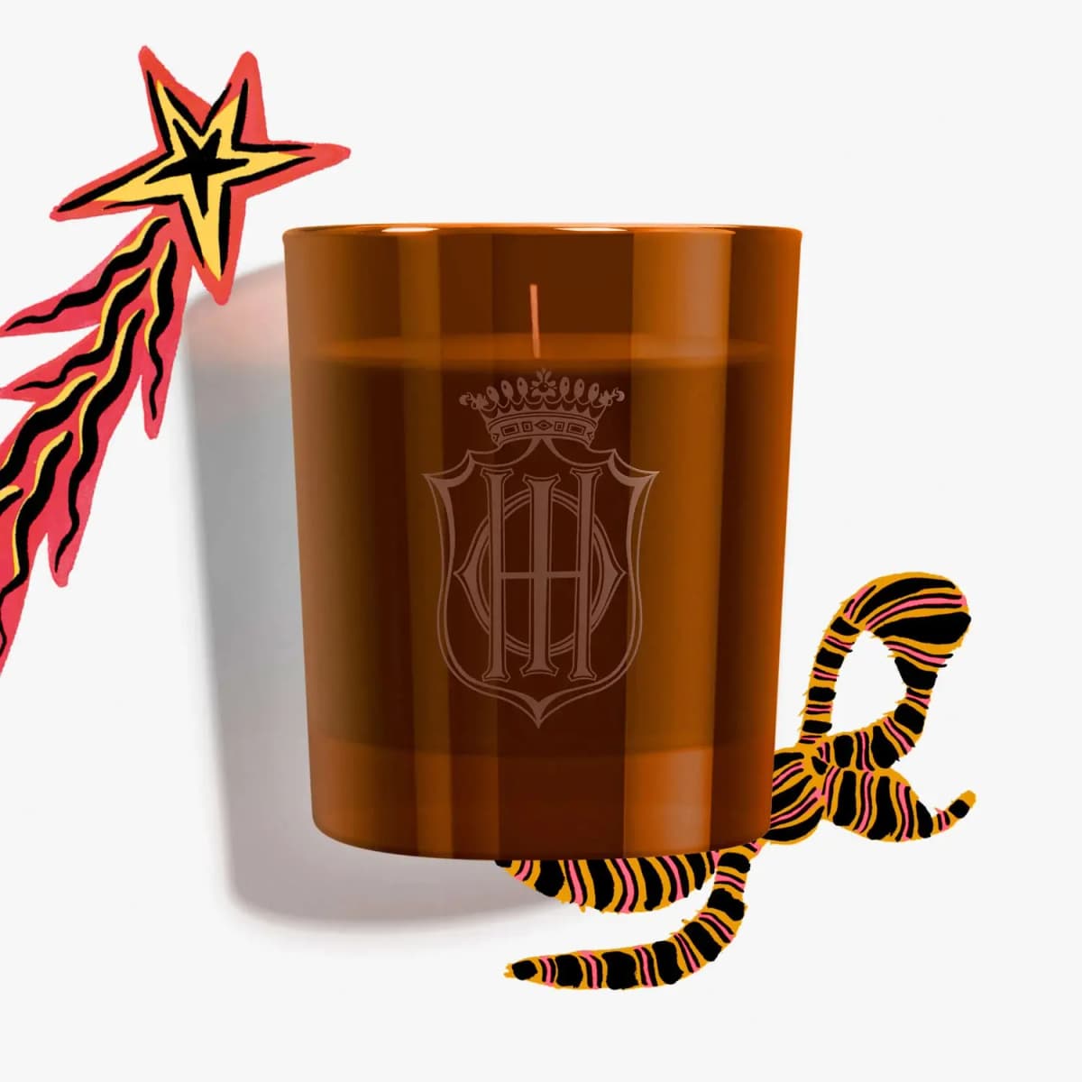 Sisley Paris Wood and Orange Zest Candle in amber glass with crowned crest, beside illustrated shooting star and striped bow