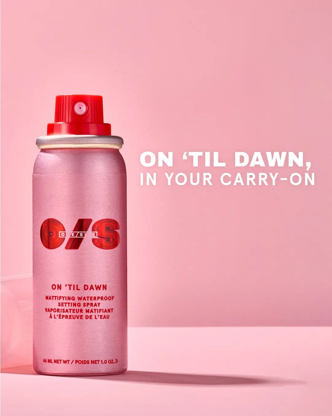 Travel-size On 'Til Dawn setting spray can on pink background with text 'On 'Til Dawn, in your carry-on