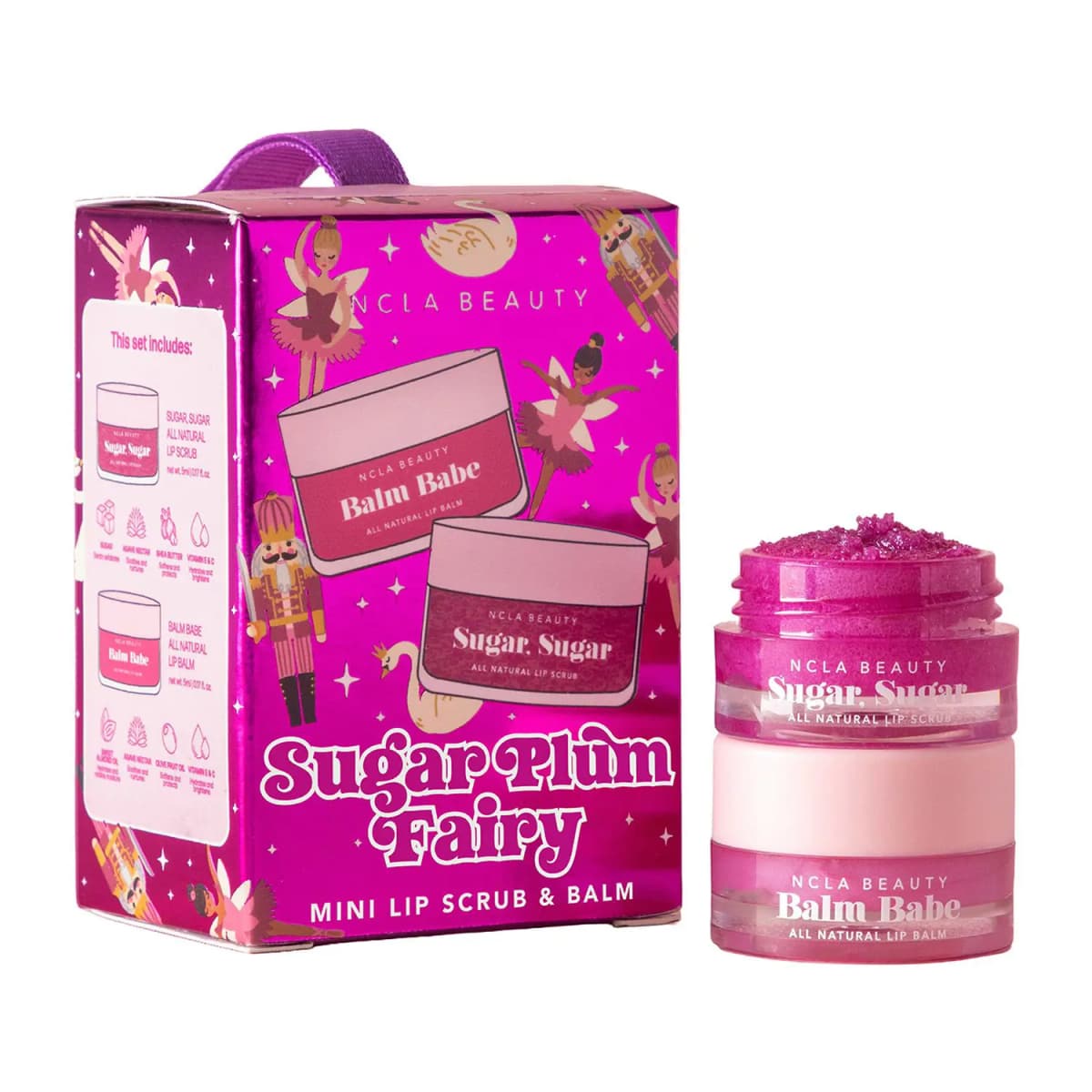 Magenta foil Sugar Plum Fairy box with ballerinas and nutcrackers beside stacked magenta scrub and balm jars