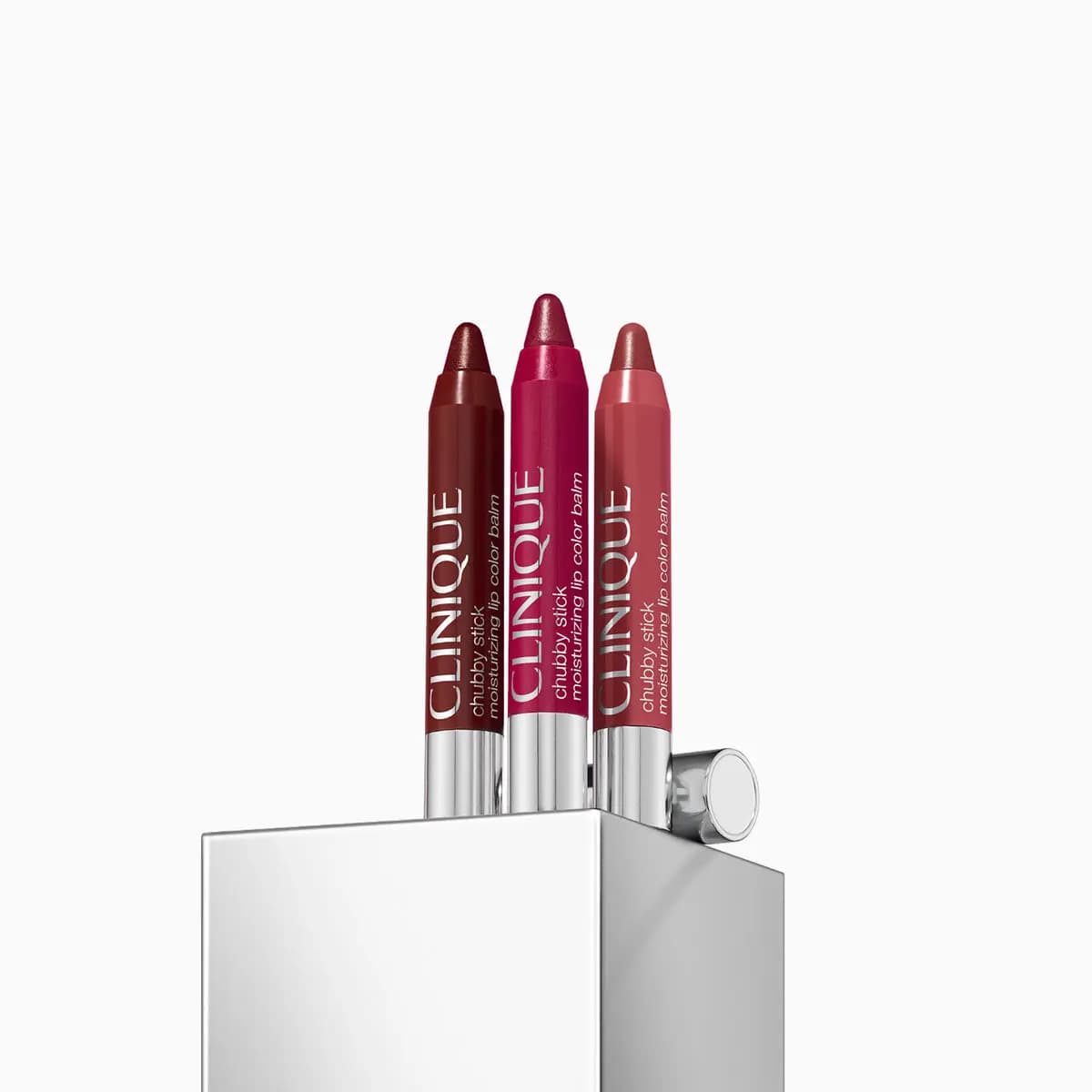 Three Chubby Stick Moisturizing Lip Color Balms in deep red, berry and rose
