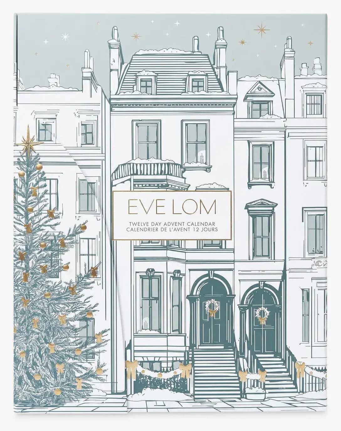Front of the EVE LOM Twelve Day Advent Calendar box, a blue-grey snowy townhouse street with gold-accented Christmas tree