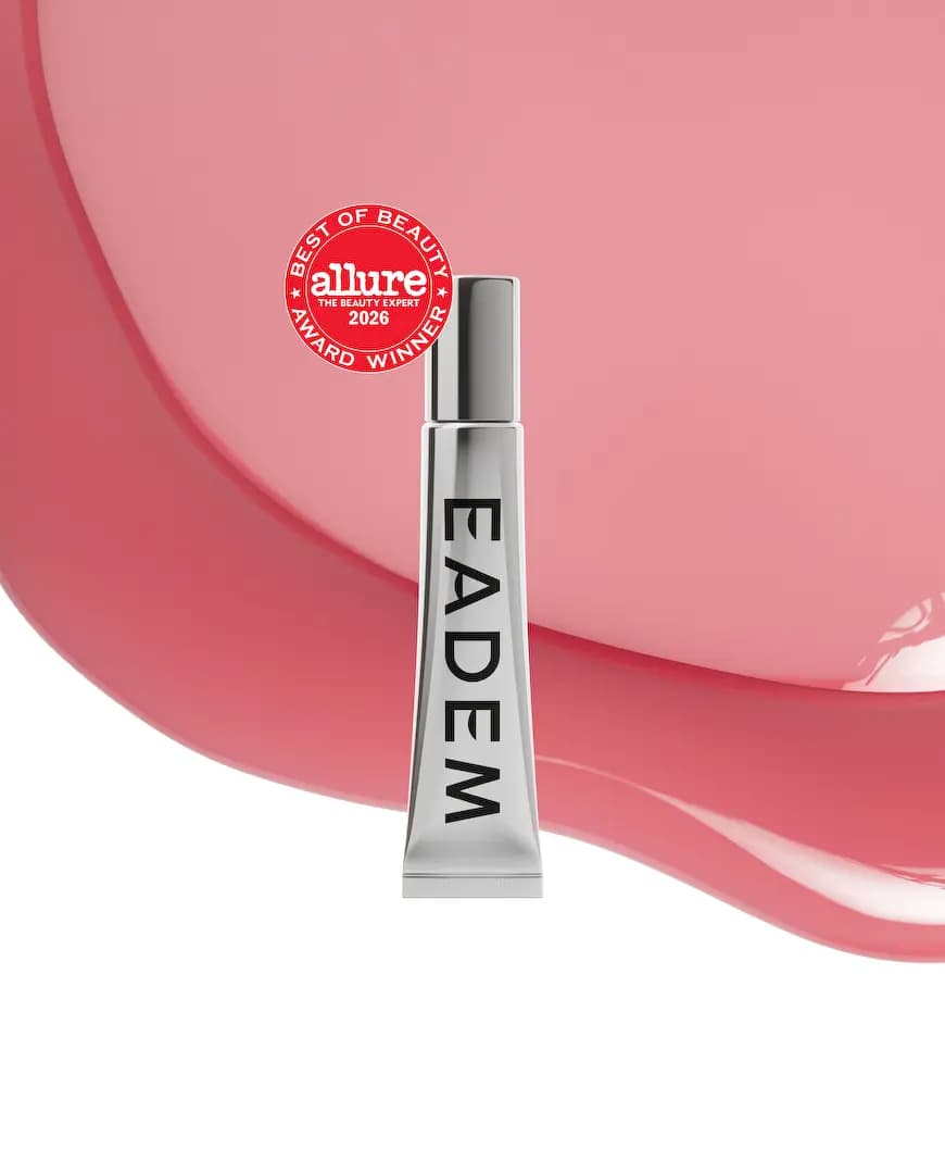 Silver EADEM tube with Allure Best of Beauty 2026 badge over a glossy petal-pink balm swirl