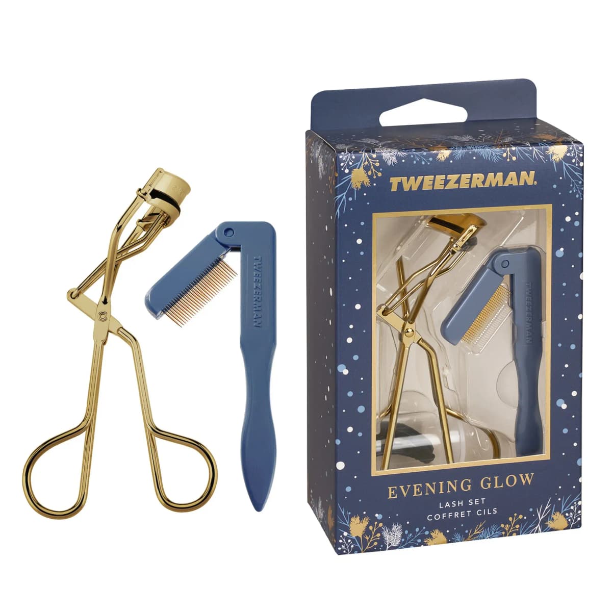 Evening Glow Lash Set with gold-tone eyelash curler and folding blue lash comb beside its navy and gold gift box