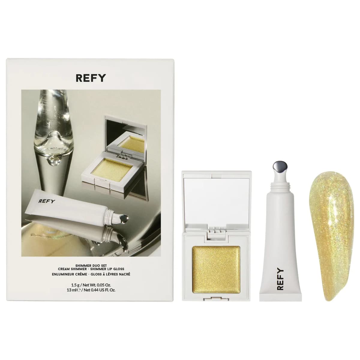 REFY Shimmer Duo Set box with an open gold Cream Shimmer compact, white gloss tube and glittery pale gold gloss swatch