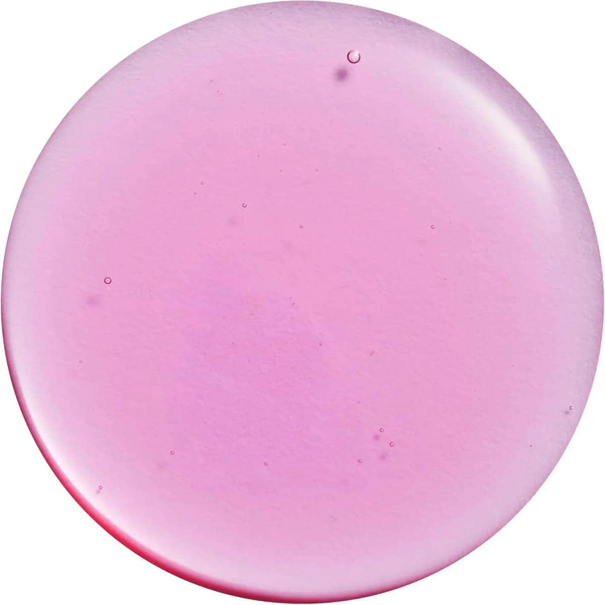 Close-up swatch of smooth translucent pink serum with tiny bubbles