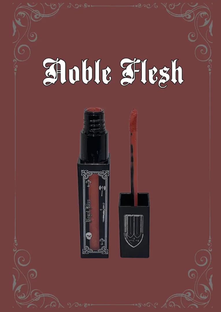 Noble Flesh tube open beside its applicator on a muted rose-brown background with silver flourishes.